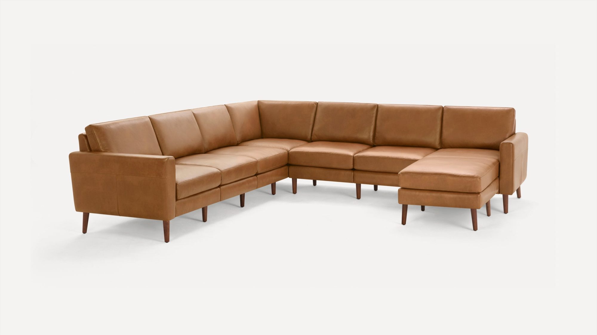 Nomad Leather 7-Seat Corner Sectional with Reversible Chaise